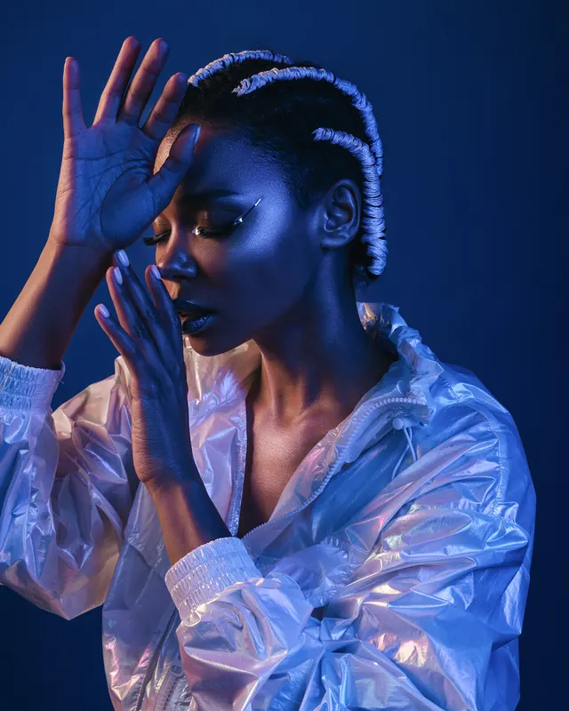 Portrait of a Woman in Reflective Clothing, photographic, luxury, dark