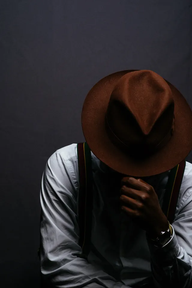 Man in Fedora Hat, minimal, photographic, dark