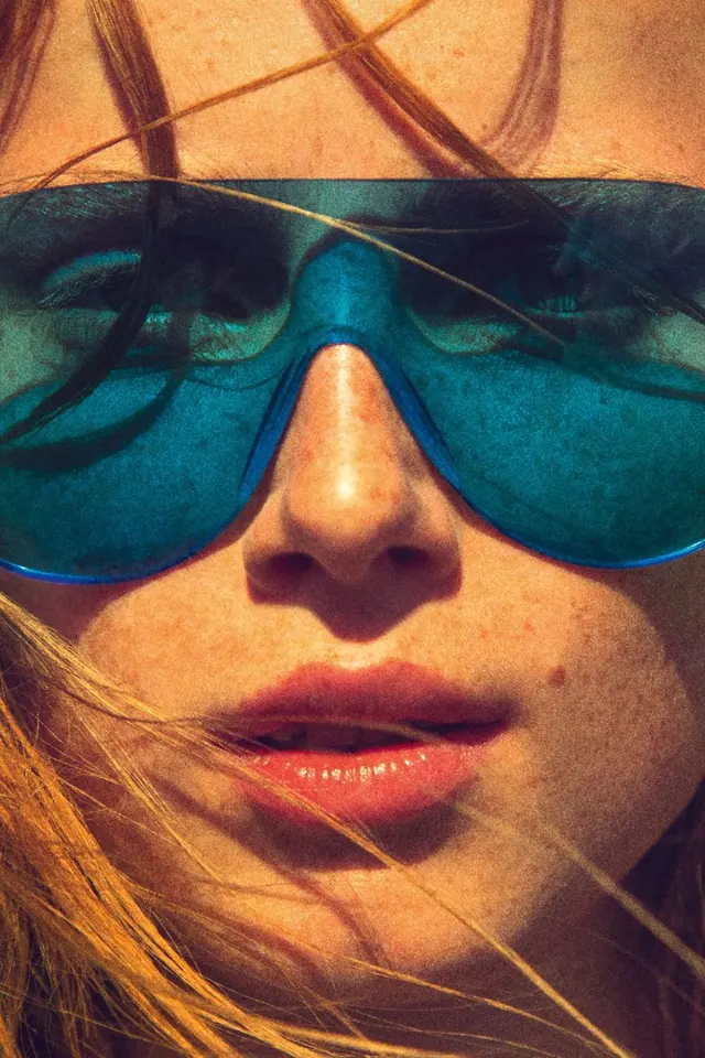 Woman in Blue Sunglasses Close-up, photographic, vibrant