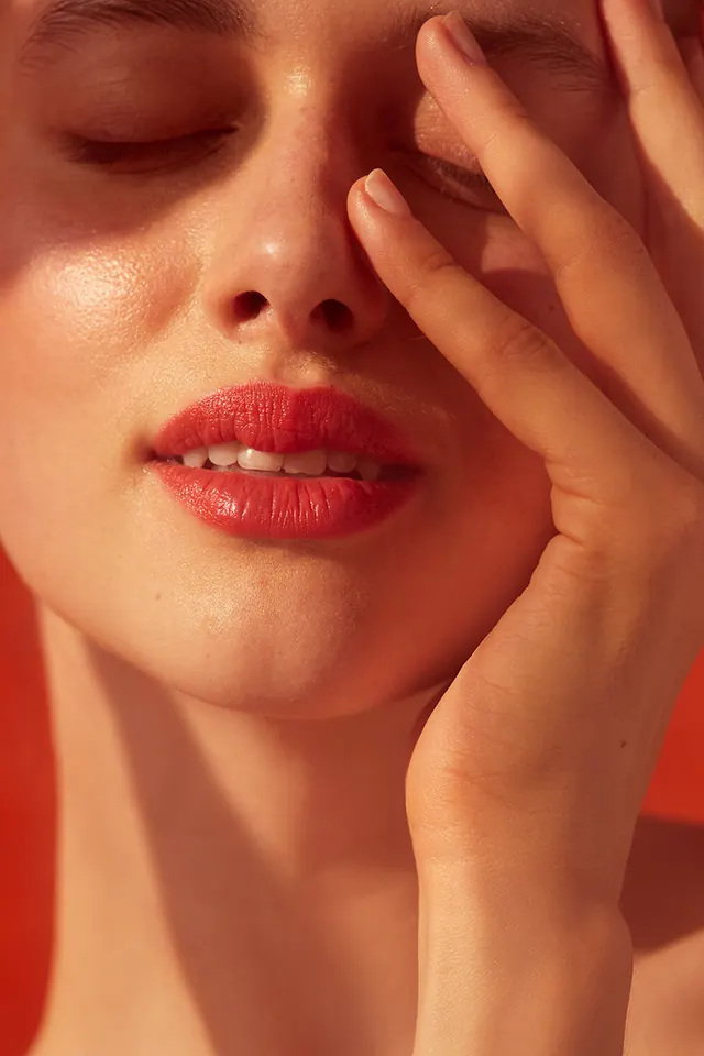 Close-up Portrait of a Woman's Face, photographic, luxury, warm