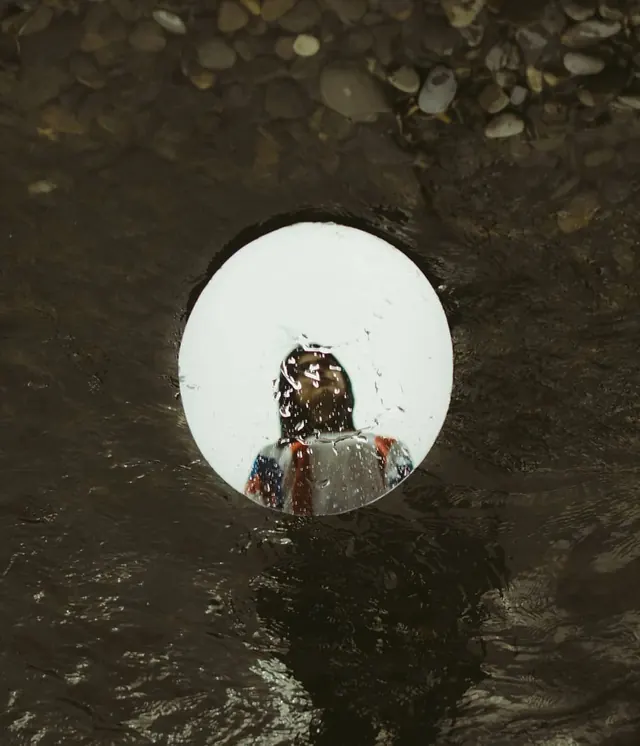 Circular Portrait in Water, photographic, organic, dark