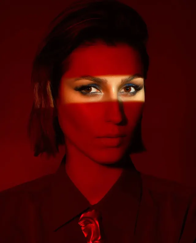 Red-Toned Portrait with White Eye Accents, photographic, abstract, dark