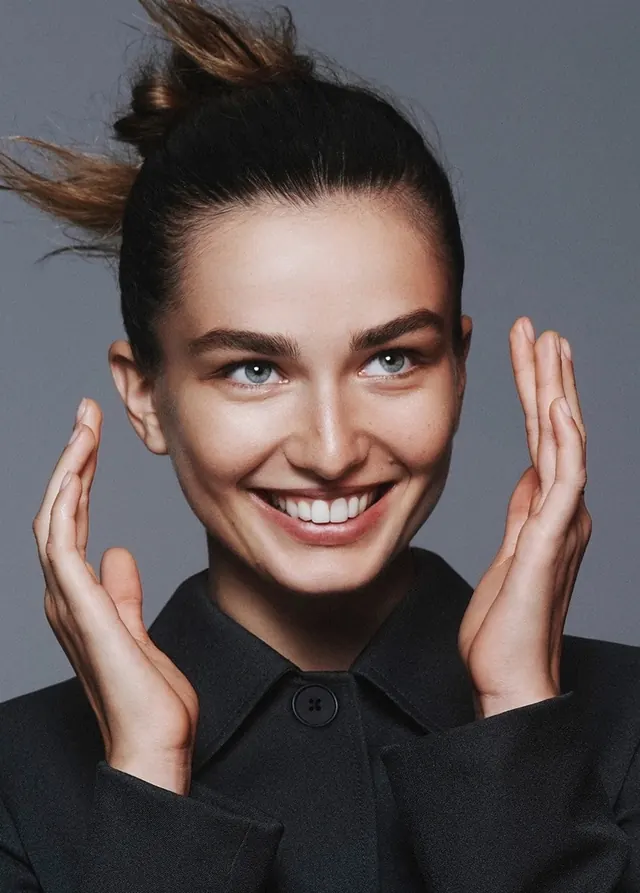 Portrait of a Smiling Woman, photographic, light-mode, high-contrast