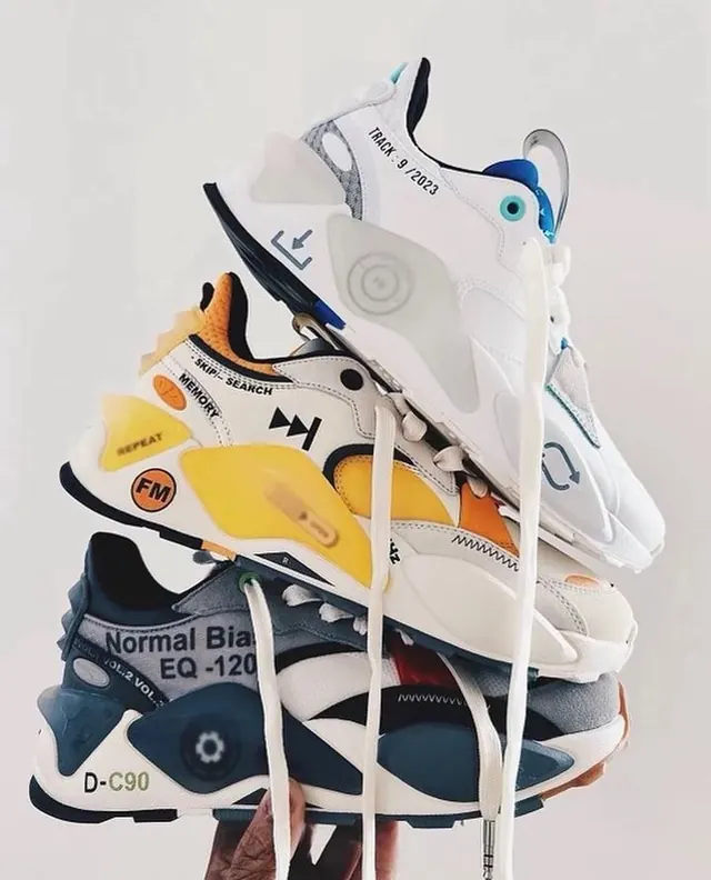 Stacked Sneaker Composition, minimal, photographic, high-contrast