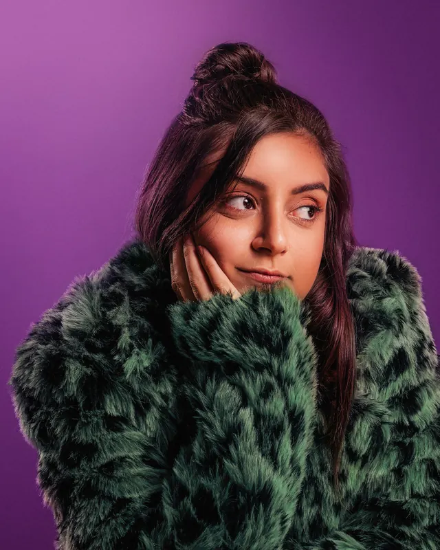 Portrait of Woman in Faux Fur, photographic, vibrant