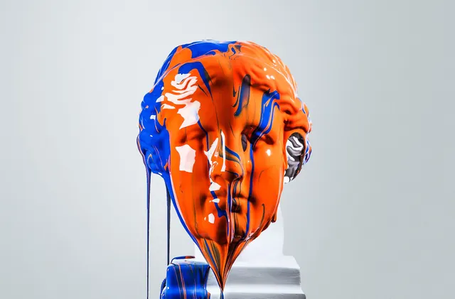 Abstract Orange and Blue Face Sculpture