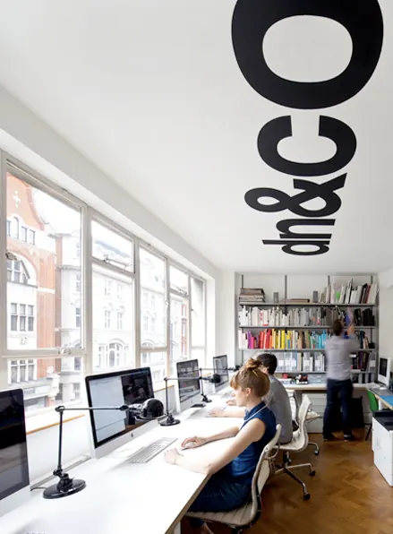 Office Interior with Large Wall Graphics, minimal, corporate-clean, high-contrast