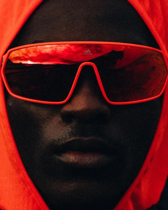 Close-up Portrait with Red Reflective Sunglasses, dark-mode, photographic, dark