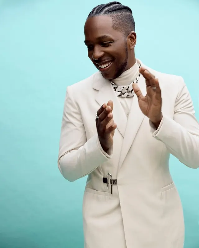 Man in White Suit Portrait, minimal, photographic, high-contrast