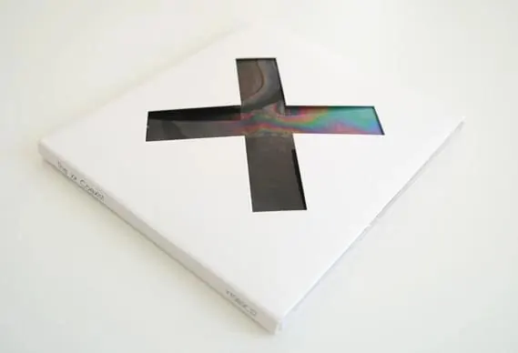 Abstract Cross Graphic on White Book, minimal, abstract, high-contrast