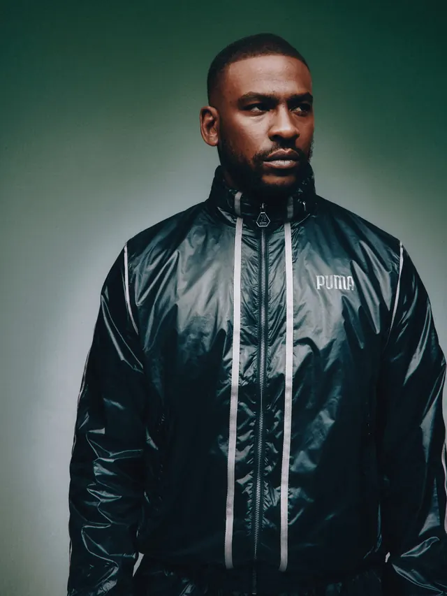 Man in Shiny Black Jacket, minimal, photographic, dark