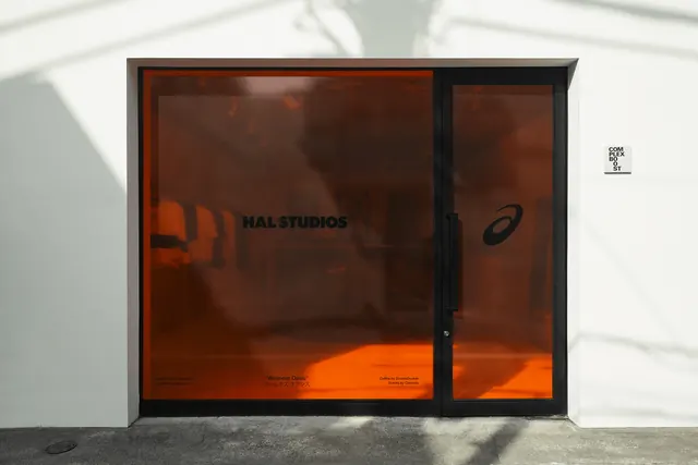 Orange Glass Storefront, minimal, corporate-clean, high-contrast