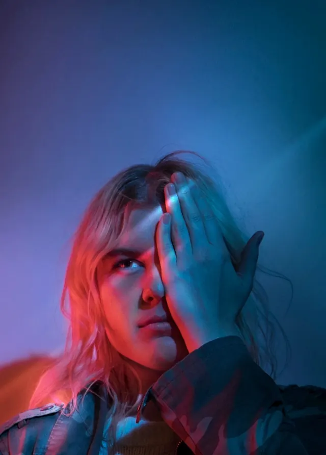 Portrait with Blue and Red Lighting, photographic, dark-mode, high-contrast