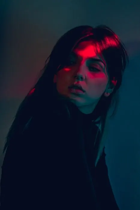 Portrait with Red Light Projection, dark-mode, photographic, dark
