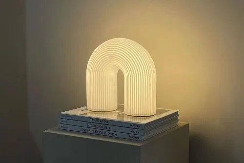 Illuminated Arch Sculpture, minimal, geometric, warm