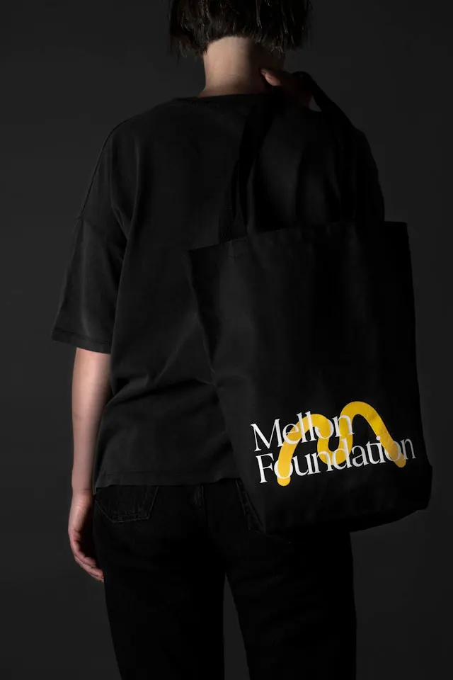 Black Tote Bag with Yellow Typography, minimal, dark-mode, dark