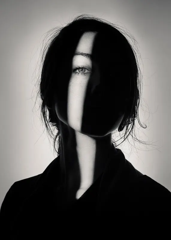High-Contrast Portrait with Shadow Play, monochrome, minimal, monochrome