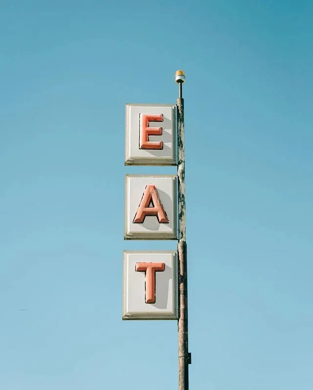 Vertical Signage Typography, minimal, brutalist, high-contrast