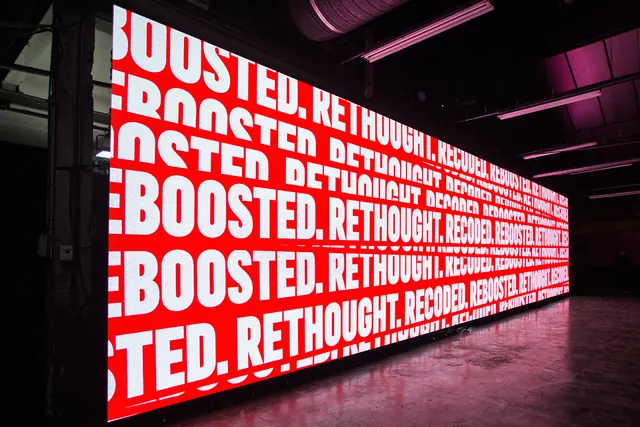 Boosted. Rethought. Glowing Neon Signage, brutalist, maximalist, vibrant