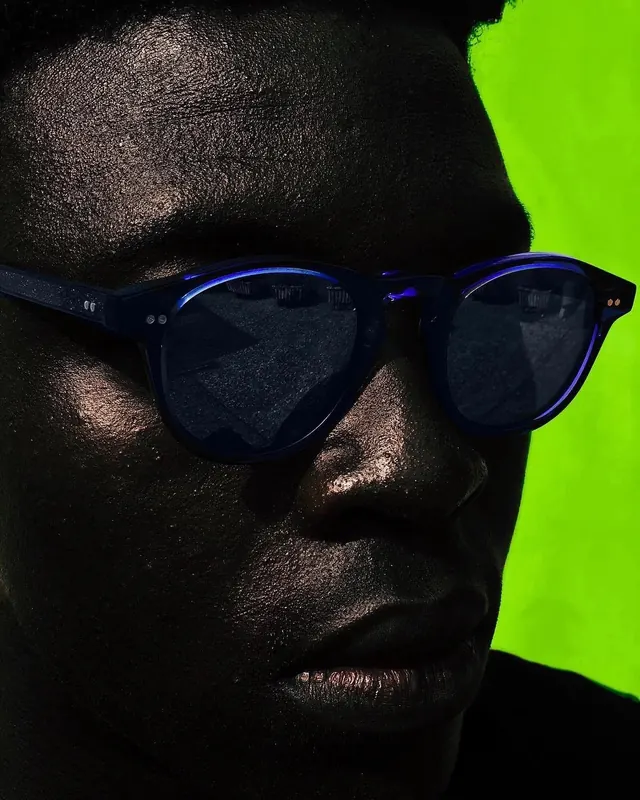 Portrait with Blue Tinted Sunglasses, dark-mode, photographic, dark