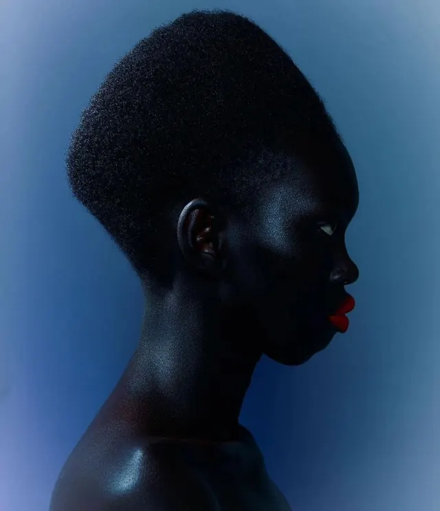 Profile of a Woman in Blue Light, dark-mode, photographic, dark