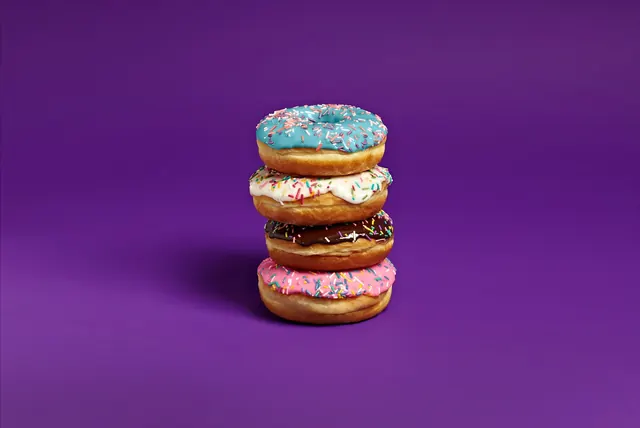 Stacked Colorful Donuts, flat, vibrant