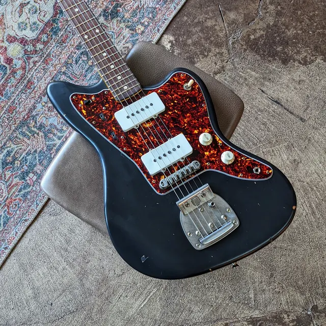 Electric Guitar on Rug, photographic, dark