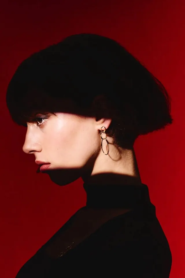 Portrait of a Woman in Red, minimal, photographic, vibrant
