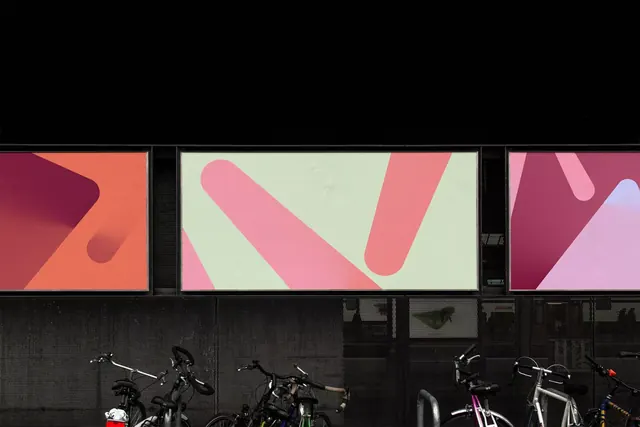 Three-panel gallery display with soft-shape graphics and bikes, minimal, corporate-clean, dark