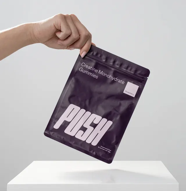 Deep-purple fitness supplement pouch with minimal typography, minimal, brutalist, dark