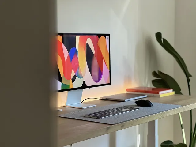 Vibrant abstract art on office desk setup, minimal, abstract, light