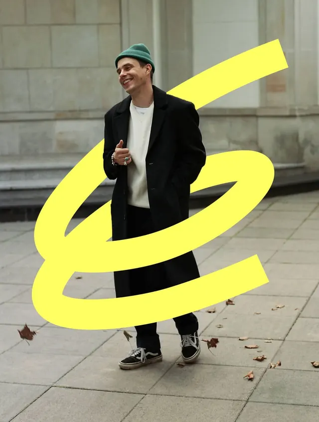 Urban street style with neon spiral graphic, minimal, playful, dark