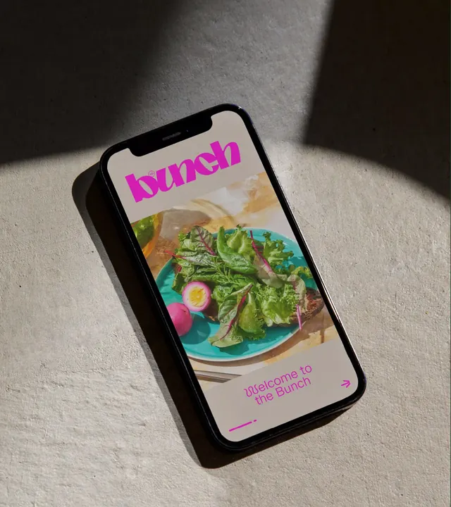 Bunch food app mobile screen with salad hero image, minimal, photographic, cool