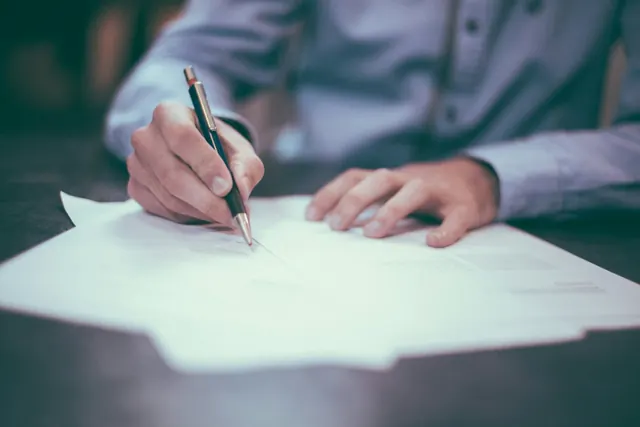 Hand writing on paper documentary photograph, photographic, light