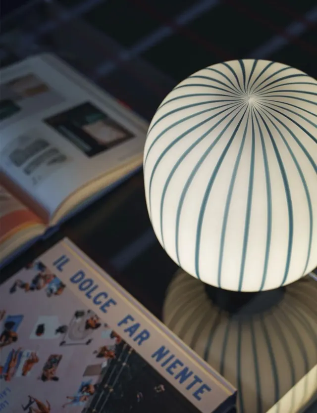 Striped abstract orb decorative object, geometric, photographic, light