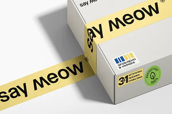 Say Meow cat food packaging with angled tape, minimal, corporate-clean, light