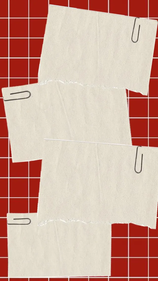 Paper and paperclips on red grid background, abstract, minimal, warm