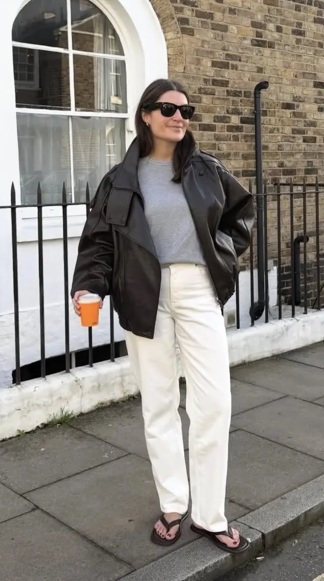 Street style oversized blazer look, minimal, photographic, dark