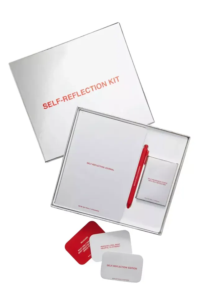 Self-reflection kit packaging with red accent, minimal, corporate-clean, light