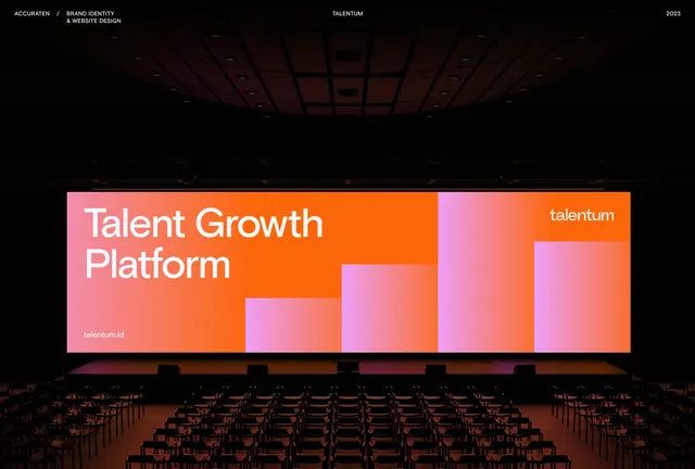 Conference stage with orange-pink gradient LED screen, gradient-heavy, corporate-clean, dark