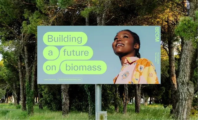 Outdoor billboard for biomass sustainability messaging, minimal, corporate-clean, muted