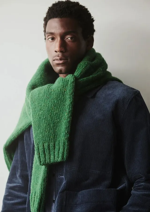 Fashion portrait with emerald scarf, photographic, minimal, muted