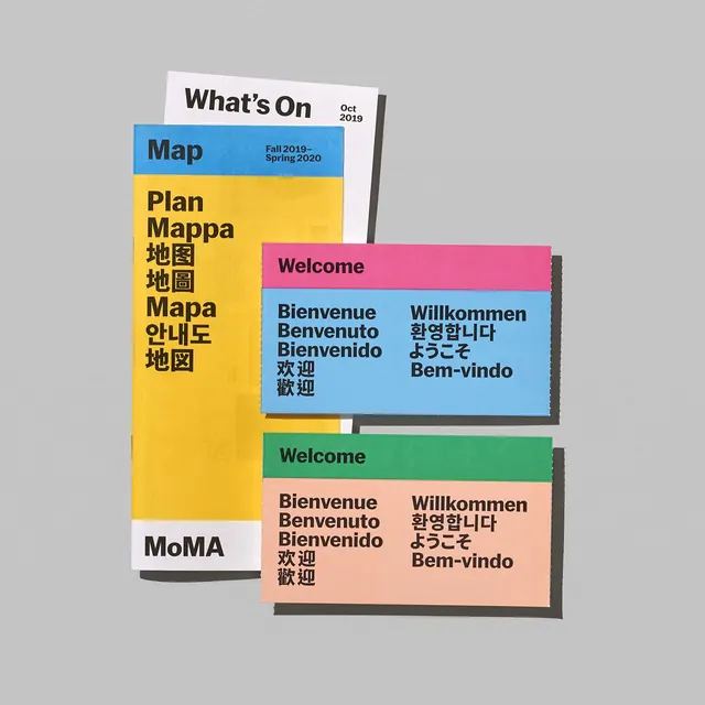 MoMA multilingual wayfinding system in color blocks, minimal, geometric, vibrant