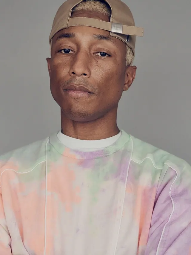 Portrait of a person in tie-dye apparel, photographic, minimal, vibrant