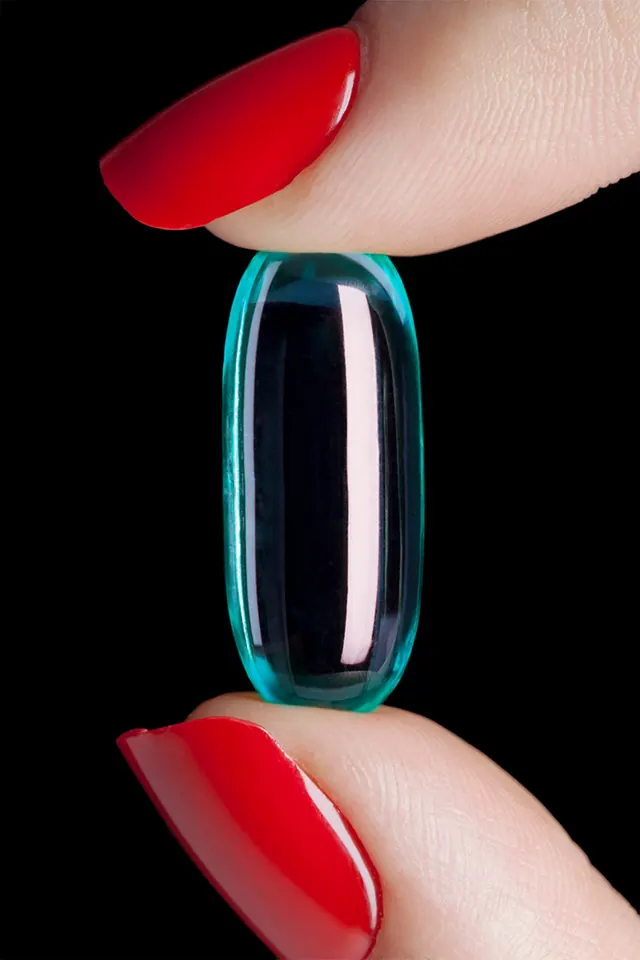 Red Nails and Blue Capsule, minimal, photographic, vibrant