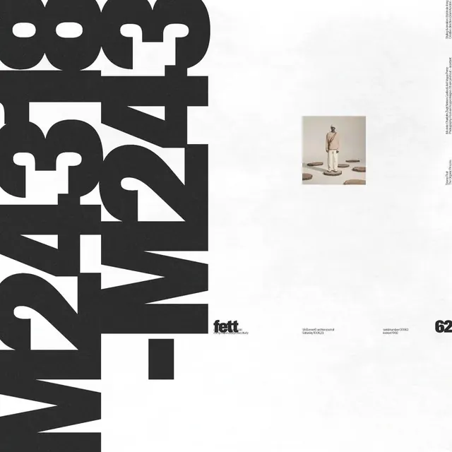 Design magazine cover with bold typography and inset image, swiss, editorial, dark