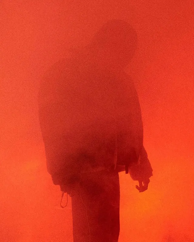 Red figure silhouette with dimensional shadow, abstract, minimalist, vibrant