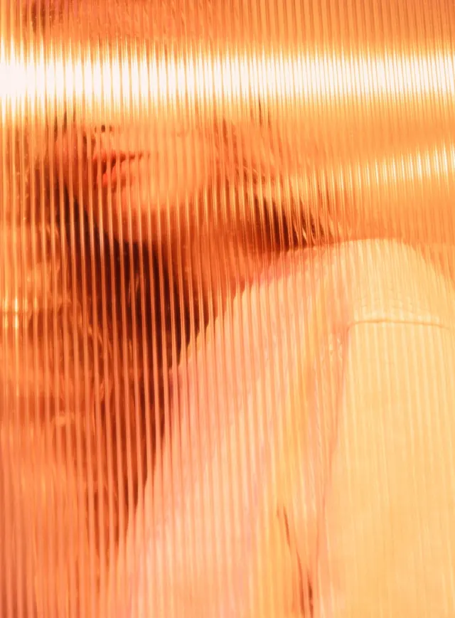 Warm orange gradient with vertical texture overlay, abstract, textured, warm