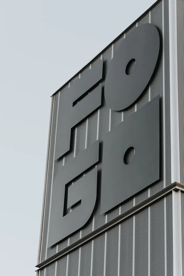 Geometric Logo on Building Facade, minimal, geometric, monochrome