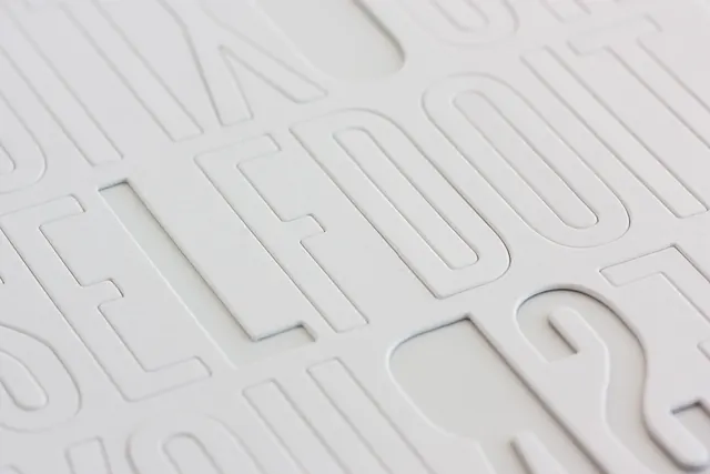 Embossed Typography Detail, minimal, geometric, monochrome